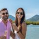 Couple enjoying sparkling wine on deck during Spirit of Cairns cruise