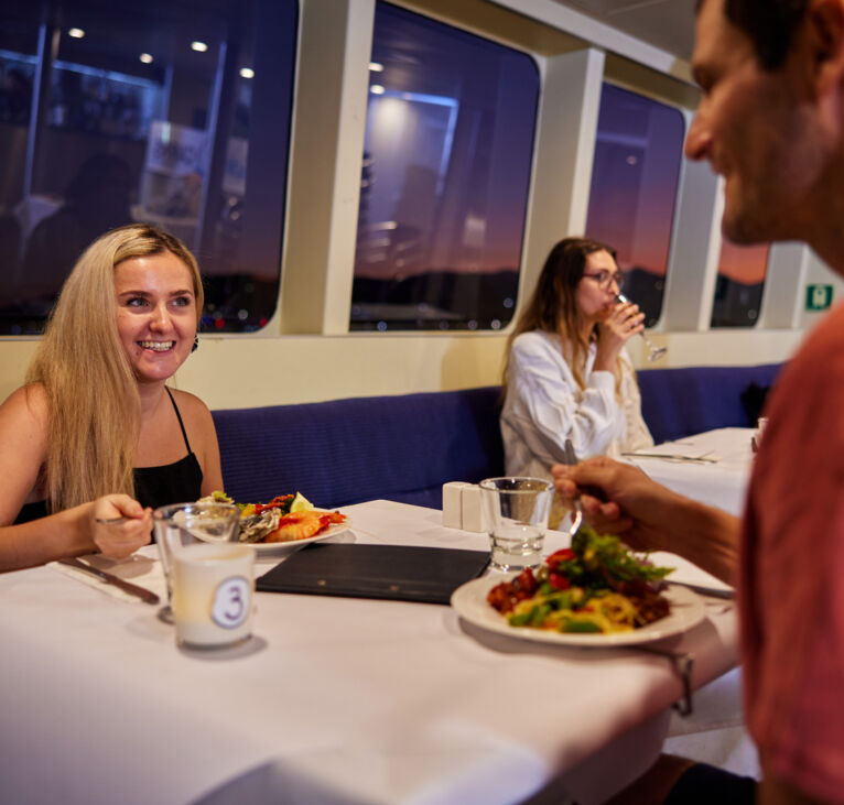 Couple dining on Spirit of Cairns